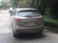 Mazda CX 5 2014 - Cần bán gấp Mazda CX 5 năm 2014, màu vàng như mới 