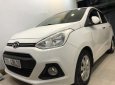 Hyundai Grand i10 2016 - Cần bán gấp Hyundai Grand i10 sản xuất năm 2016, màu trắng chính chủ