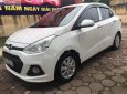 Hyundai Grand i10  AT 2016 - Cần bán lại xe Hyundai Grand i10 AT năm 2016, màu trắng, nhập khẩu  