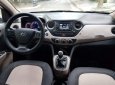 Hyundai Grand i10 2014 - Gia đình cần bán xe Hyundai Grand i10 sản xuất 2014, Đk tháng 12/2014, màu trắng