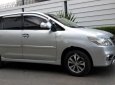 Toyota Innova 2.0E 2015 - Gia đình cần bán xe Toyota Innova E đời 2015 số sàn màu bạc