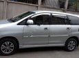 Toyota Innova 2.0E 2015 - Gia đình cần bán xe Toyota Innova E đời 2015 số sàn màu bạc