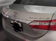 Toyota Corolla altis 1.8G AT 2014 - Chính chủ bán ô tô Toyota Corolla Altis 1.8G AT đời 2014, màu bạc, giá 640tr