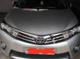 Toyota Corolla altis 1.8G AT 2014 - Chính chủ bán ô tô Toyota Corolla Altis 1.8G AT đời 2014, màu bạc, giá 640tr