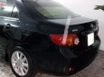 Toyota Corolla altis  2.0 2009 - Cần bán gấp Toyota Corolla Altis 2.0 sản xuất năm 2009, màu đen, bảo hành tại Toyota