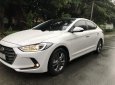 Hyundai Elantra GLS 1.6AT 2017 - Cần bán lại xe Hyundai Elantra GLS 1.6AT sản xuất 2017, màu trắng xe gia đình