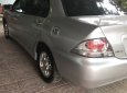 Mitsubishi Lancer 2004 - Cần bán gấp Mitsubishi Lancer sản xuất 2004, màu xám (ghi) còn mới, giá chỉ 213 triệu