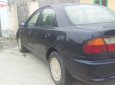 Mazda 323 2000 - Cần bán xe cũ Mazda 323 đời 2000, màu đen, nhập khẩu nguyên chiếc