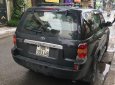 Ford Escape 3.0 V6 2003 - Cần bán lại xe Ford Escape 3.0 V6 sản xuất năm 2003, màu đen 