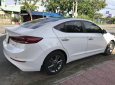 Hyundai Elantra 1.6AT GLS 2017 - Bán Hyundai Elantra 1.6AT GLS đời T12/2017, màu trắng, xe gia đình mới như hãng