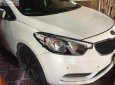 Kia K3 1.6 MT 2014 - Cần bán lại xe Kia K3 1.6 MT đời 2014, màu trắng  