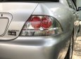 Mitsubishi Lancer 2004 - Cần bán gấp Mitsubishi Lancer sản xuất 2004, màu xám (ghi) còn mới, giá chỉ 213 triệu