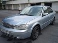 Ford Laser   2004 - Cần bán gấp Ford Laser năm 2004, màu bạc