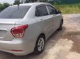 Hyundai Grand i10   2015 - Bán xe Hyundai Grand i10 đời 2015, màu bạc số sàn