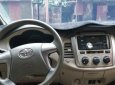 Toyota Innova   2.0 MT  2016 - Cần bán xe Toyota Innova 2.0 MT năm sản xuất 2016, màu ghi vàng, xe gia đình, giá tốt