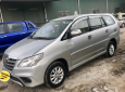 Toyota Innova 2.0E 2014 - Bán Toyota Innova năm 2014 màu bạc, giá tốt 595tr hỗ trợ 100% phí trước bạ