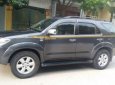 Toyota Fortuner 2011 - Cần bán gấp Toyota Fortuner năm sản xuất 2011, màu xám số sàn