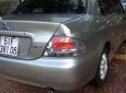 Mitsubishi Lancer 2004 - Bán Mitsubishi Lancer sản xuất năm 2004, màu ghi vàng