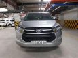 Toyota Innova E MT 2016 - Cần bán gấp Toyota Innova E MT năm 2016, màu bạc số sàn