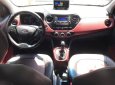 Hyundai Grand i10 1.2AT 2015 - Bán ô tô Hyundai Grand i10 1.2AT sản xuất 2015, màu cam, xe nhập đi giữ gìn