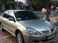 Mitsubishi Lancer 2004 - Bán Mitsubishi Lancer sản xuất năm 2004, màu ghi vàng