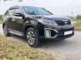 Kia Sorento 2.4L  GAT 2016 - Chính chủ cần tiền bán xe Kia Sorento 2.4L bản GAT sản xuất 2016, màu đen