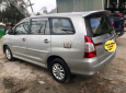 Toyota Innova 2.0E 2014 - Bán Toyota Innova năm 2014 màu bạc, giá tốt 595tr hỗ trợ 100% phí trước bạ