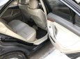 Toyota Camry 2.4G 2001 - Cần bán Toyota Camry 2.4G năm sản xuất 2001, màu đen xe gia đình 