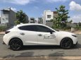 Mazda 3 2015 - Cần bán gấp Mazda 3 năm 2015 màu trắng, giá 600 triệu