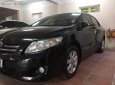 Toyota Corolla altis 2009 - Bán Toyota Corolla Altis sản xuất 2009, màu đen đã đi 80.600km