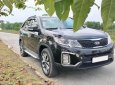 Kia Sorento 2.4L  GAT 2016 - Chính chủ cần tiền bán xe Kia Sorento 2.4L bản GAT sản xuất 2016, màu đen