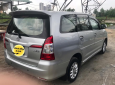 Toyota Innova 2.0E 2014 - Bán Toyota Innova năm 2014 màu bạc, giá tốt 595tr hỗ trợ 100% phí trước bạ