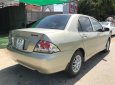 Mitsubishi Galant 1.5 2003 - Bán lại xe Mitsubishi Galant 1.5 2003, màu vàng cát