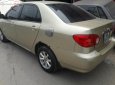 Toyota Corolla altis 1.3 G 2003 - Bán Toyota Corolla altis 1.3 G năm 2003, màu vàng cát