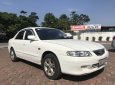 Mazda 626 2001 - Cần bán xe Mazda 626 sản xuất năm 2001, màu trắng xe gia đình, 125tr