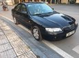 Mazda 626 2001 - Cần bán lại xe Mazda 626 2001, màu đen, xe gia đình