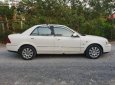 Ford Laser GHIA 1.8 AT 2003 - Bán Ford Laser GHIA 1.8 AT 2003, màu trắng, xe gia đình