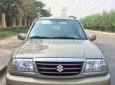 Suzuki Grand vitara  AT 2003 - Cần bán lại xe Suzuki Grand vitara AT năm 2003, màu vàng số tự động