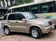 Suzuki Grand vitara  AT 2003 - Cần bán lại xe Suzuki Grand vitara AT năm 2003, màu vàng số tự động