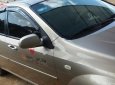 Daewoo Lacetti EX 2011 - Gia đình bán Daewoo Lacetti EX đời 2011, màu vàng