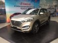 Hyundai Tucson  2.0AT 2018 - Bán ô tô Hyundai Tucson đời 2018, màu vàng giá tốt