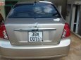 Daewoo Lacetti EX 2011 - Gia đình bán Daewoo Lacetti EX đời 2011, màu vàng