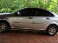 Daewoo Lacetti 2009 - Cần bán gấp Daewoo Lacetti 2009, màu bạc