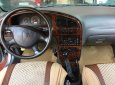 Kia Spectra 2003 - Cần bán gấp Kia Spectra đời 2003, màu bạc, 135tr