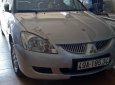 Mitsubishi Lancer 2004 - Cần bán xe cũ Mitsubishi Lancer năm sản xuất 2004, màu bạc xe gia đình