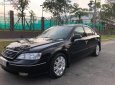 Ford Mondeo 2.0 2003 - Bán xe Ford Mondeo 2.0 năm sản xuất 2003, màu đen, xe nhập 