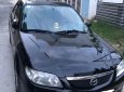 Mazda 323 2004 - Bán Mazda 323 năm 2004, màu đen xe gia đình