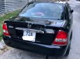 Mazda 323 2004 - Bán Mazda 323 năm 2004, màu đen xe gia đình