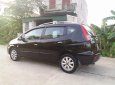 Chevrolet Vivant 2009 - Gia đình cần bán Vivant 2009, số sàn, màu đen, 7 chỗ, còn đẹp như mới