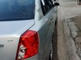 Daewoo Lacetti   2010 - Cần bán gấp Daewoo Lacetti 2010, màu bạc, xe nhập